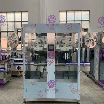 기계 파나소닉 모터 슬리브 적용기에게 기계 파나소닉 모터 슬리브 적용기 라벨을 붙이는 1L 패트병