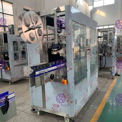 기계 파나소닉 모터 슬리브 적용기에게 기계 파나소닉 모터 슬리브 적용기 라벨을 붙이는 1L 패트병