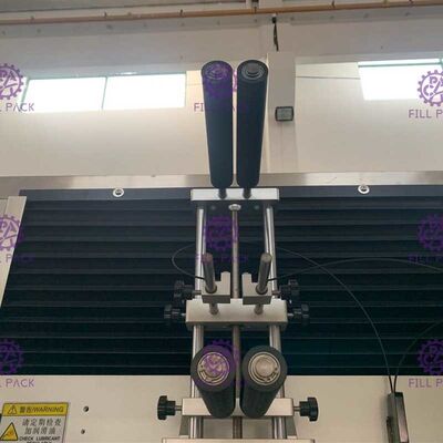 주스 병 레테르를 붙이는 기계