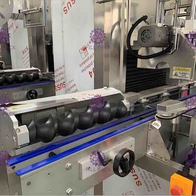 주스 병 레테르를 붙이는 기계